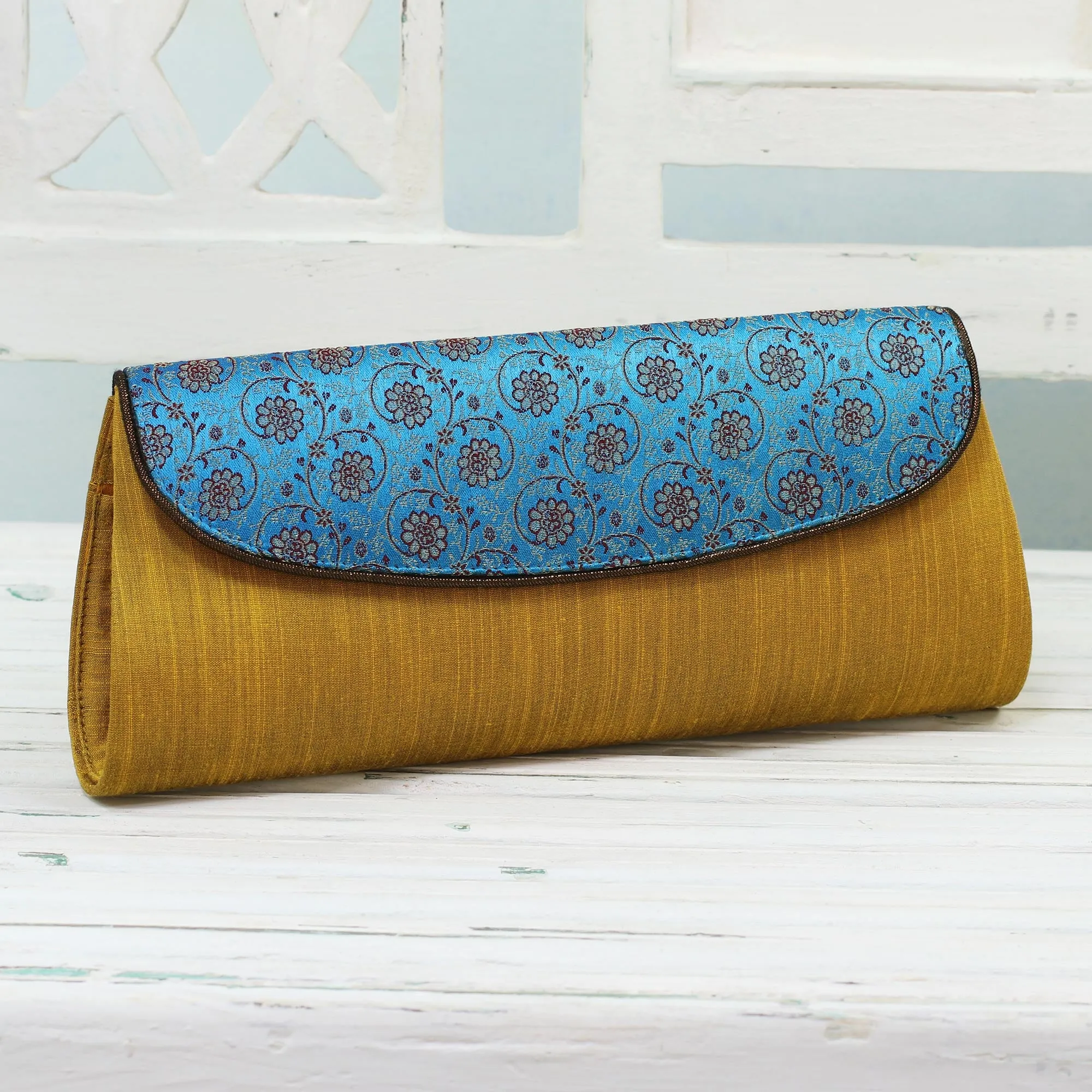 Amber Field Amber and Cyan Clutch Handbag with Floral Pattern from India